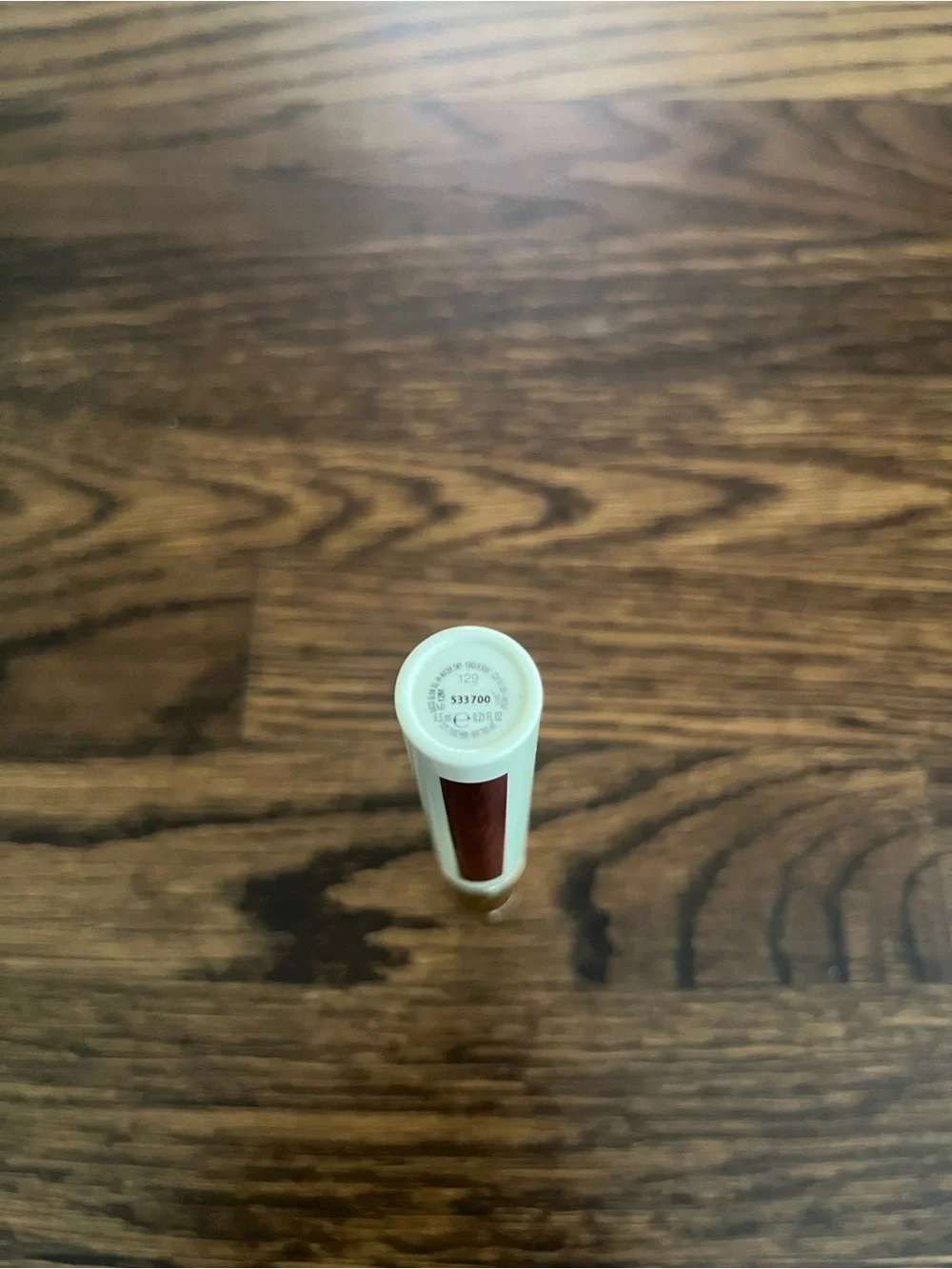 Gucci Oil-In-Water Tint Hydrating Stain in shade 129 “Paula Maple” (maple red)